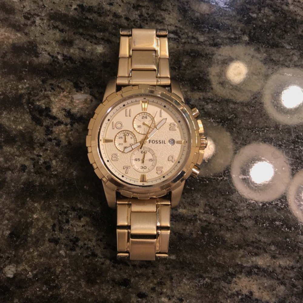 Gold fossil watch